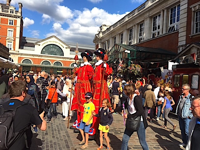 Street performers and festive costumes add life to Covent Garden